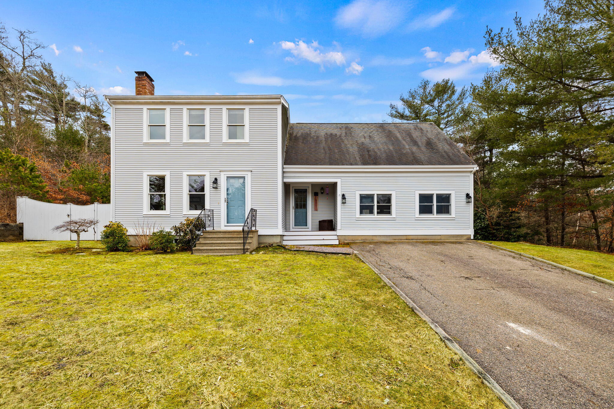 21 Heather Hill Road Buzzards Bay, MA 02532 - Photo 2 of 32 a front view of house with yard outdoor seating and barbeque oven