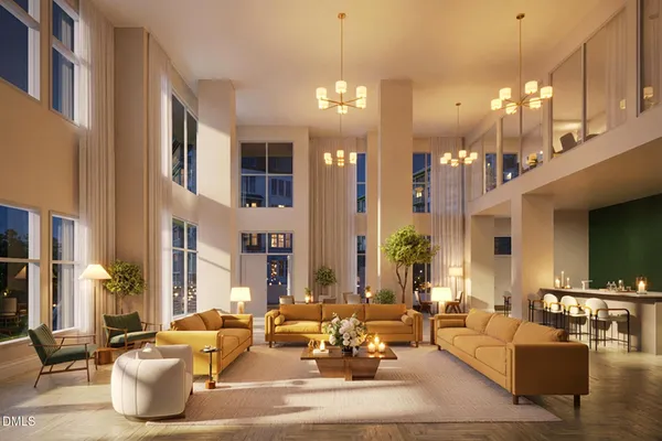 a living room with patio furniture and a chandelier