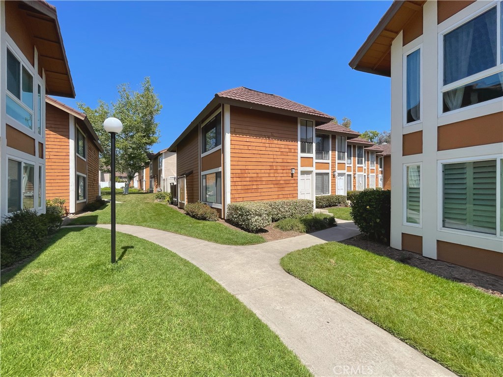 25885 Trabuco Road, Unit 33 Lake Forest, CA 92630 - Photo 1 of 1 a house view with a garden space