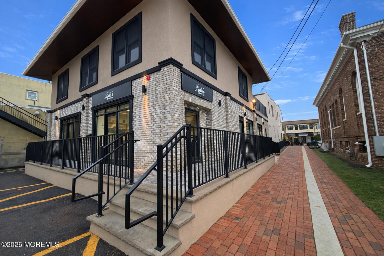 100 Market Yard, Unit 1 Freehold, NJ 07728 - Photo 5 of 12 a view of a brick building with many windows