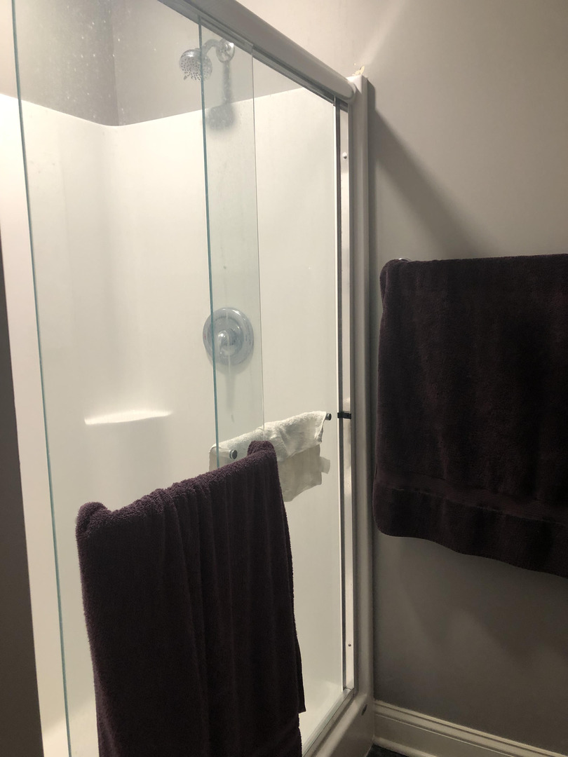 Undisclosed Address Manhattan, IL 60442 - Photo 8 of 9 a bathroom with a shower and a tub