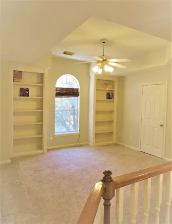 a view of entryway and hall with a window
