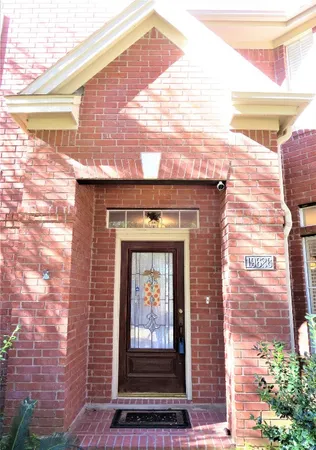 a front view of a house with glass windows