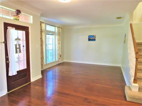 a view of livingroom with furniture and wooden floor