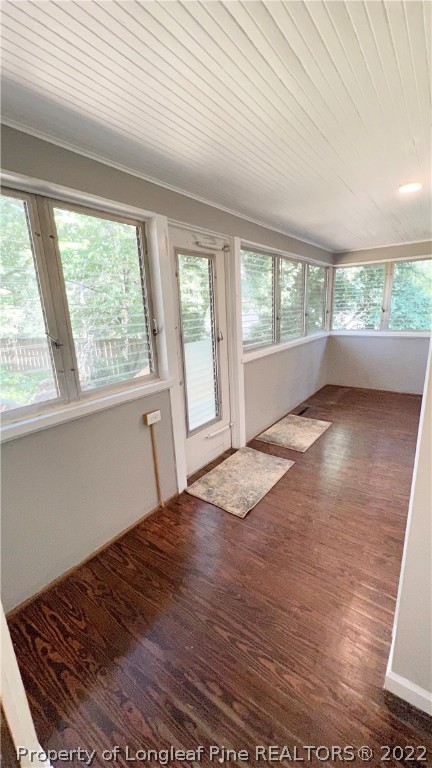 516 Valley Road Fayetteville, NC 28305 - Photo 18 of 48 an empty room with wooden floor and windows