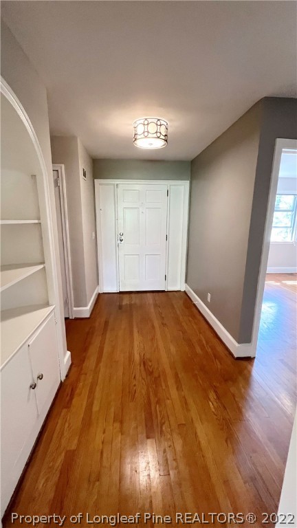 516 Valley Road Fayetteville, NC 28305 - Photo 2 of 48 wooden floor in an empty room with a window