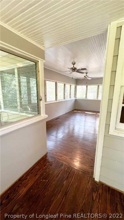 516 Valley Road Fayetteville, NC 28305 - Photo 22 of 48 a view of an empty room with wooden floor and a window