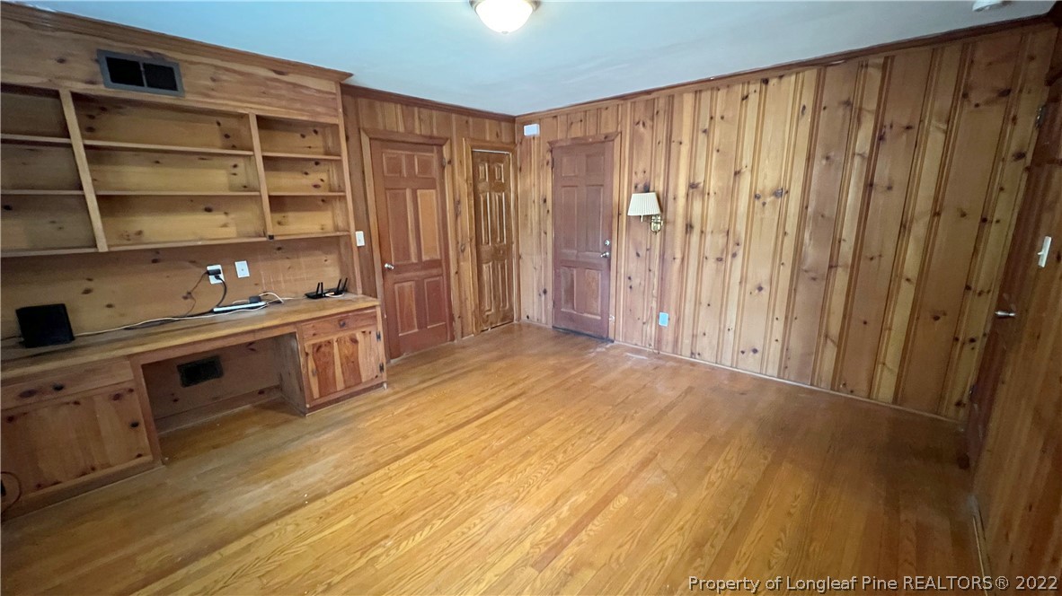516 Valley Road Fayetteville, NC 28305 - Photo 26 of 48 a view of a kitchen with cabinets