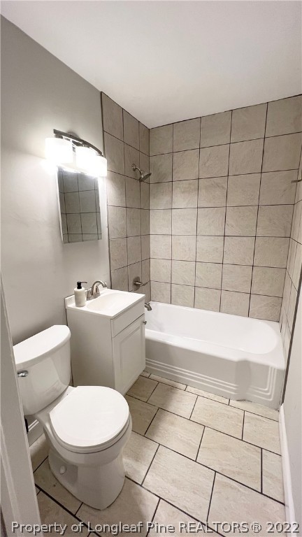 516 Valley Road Fayetteville, NC 28305 - Photo 28 of 48 a bathroom with a toilet a sink and bathtub