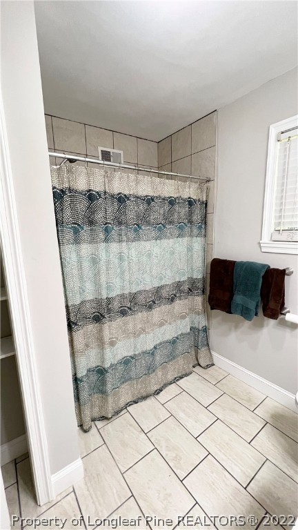 516 Valley Road Fayetteville, NC 28305 - Photo 35 of 48 a bathroom with a shower