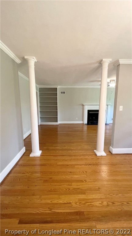 516 Valley Road Fayetteville, NC 28305 - Photo 10 of 48 a view of empty room with wooden floor