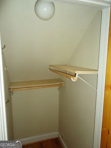 a view of a room with racks on the wall