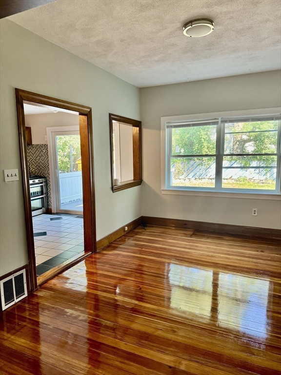 10 Clay Avenue Everett, MA 02149 - Photo 5 of 17 a view of an empty room and window