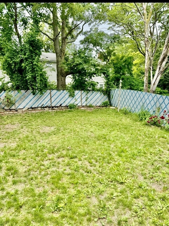 10 Clay Avenue Everett, MA 02149 - Photo 7 of 17 a view of swimming pool from a yard