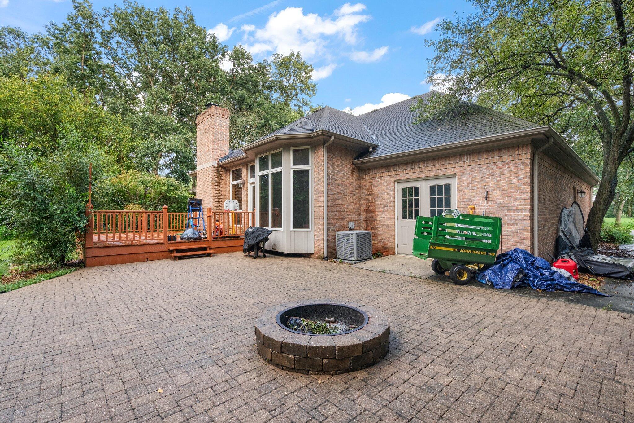 6614 Ridgeview Drive Demotte, IN 46310 - Photo 43 of 50 a view of a house with backyard and sitting area