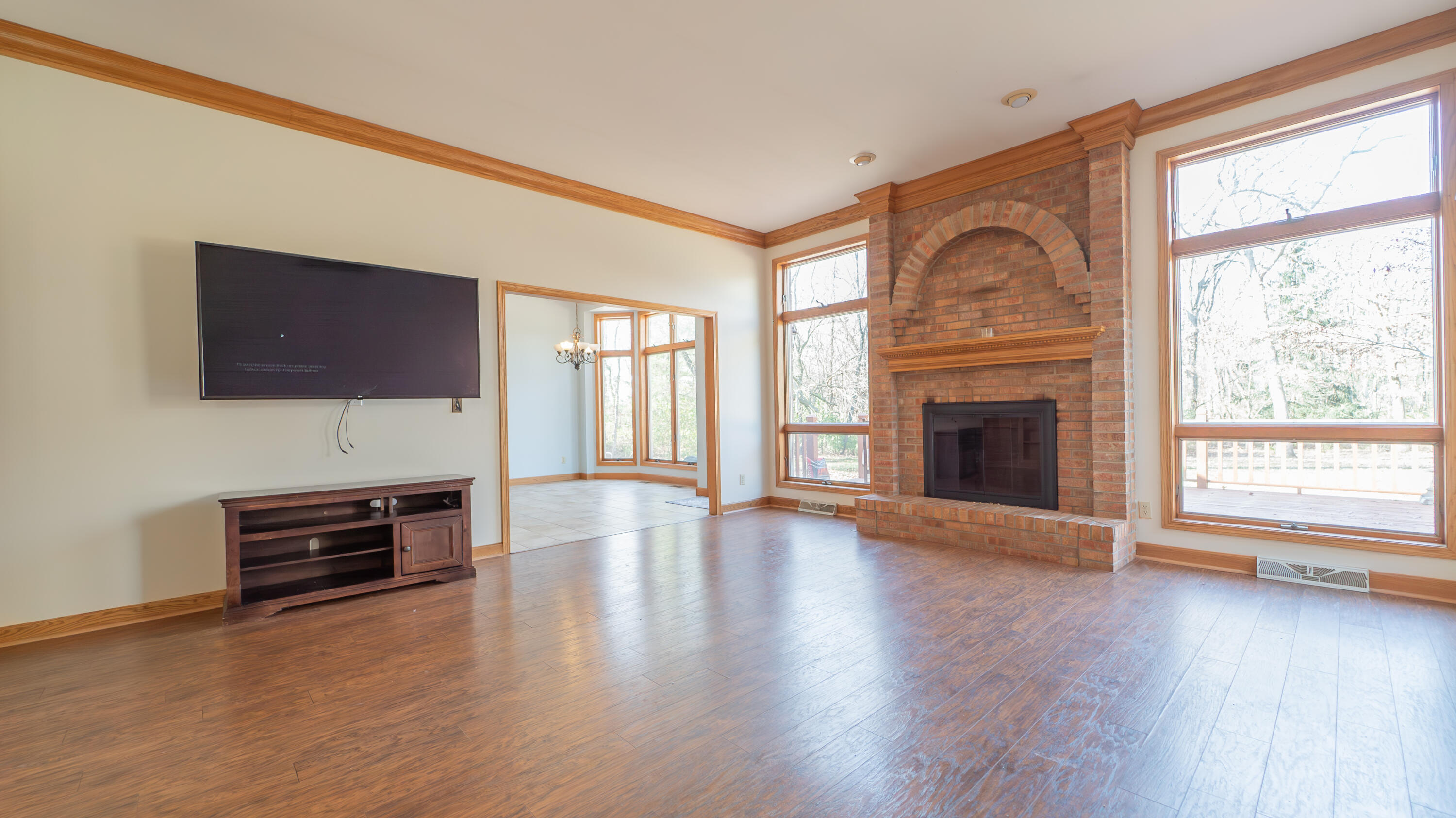 6614 Ridgeview Drive Demotte, IN 46310 - Photo 9 of 50 a view of livingroom with furniture flat screen tv and window