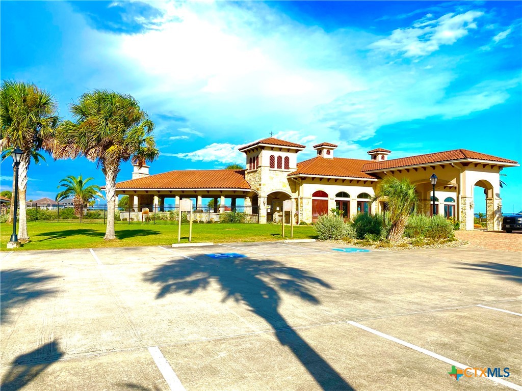 68 West Tuscany Way Port O'Connor, TX 77982 - Photo 5 of 15 a front view of building with yard