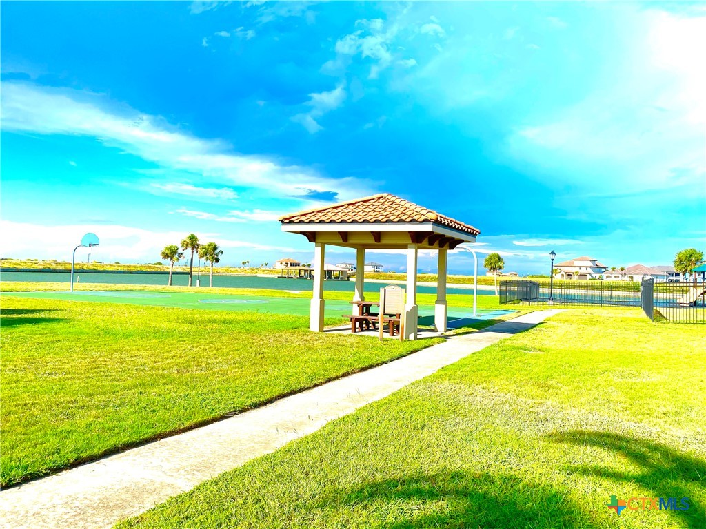 68 West Tuscany Way Port O'Connor, TX 77982 - Photo 9 of 15 a view of a swimming pool with an ocean view