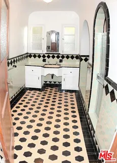 a black and white checkered floor with a black white checkered floor