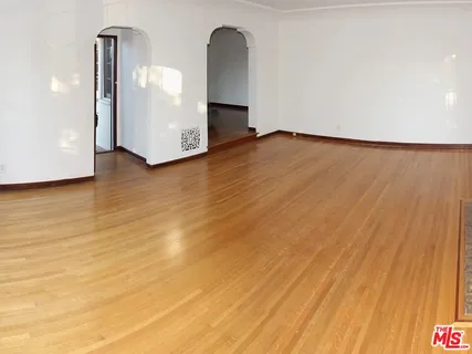 a bathroom with a bathtub and a mirror