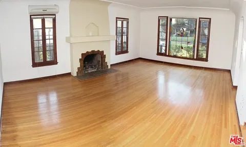 a view of livingroom with furniture and wooden floor
