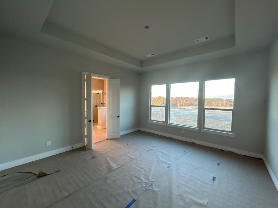 803 Vly Rdg Road Van Alstyne, TX 75495 - Photo 8 of 15 an empty room with a window