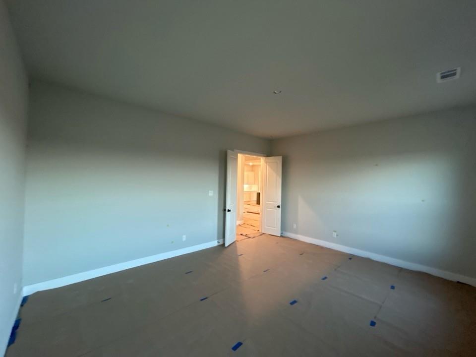 803 Vly Rdg Road Van Alstyne, TX 75495 - Photo 10 of 15 an empty room with a empty space and window