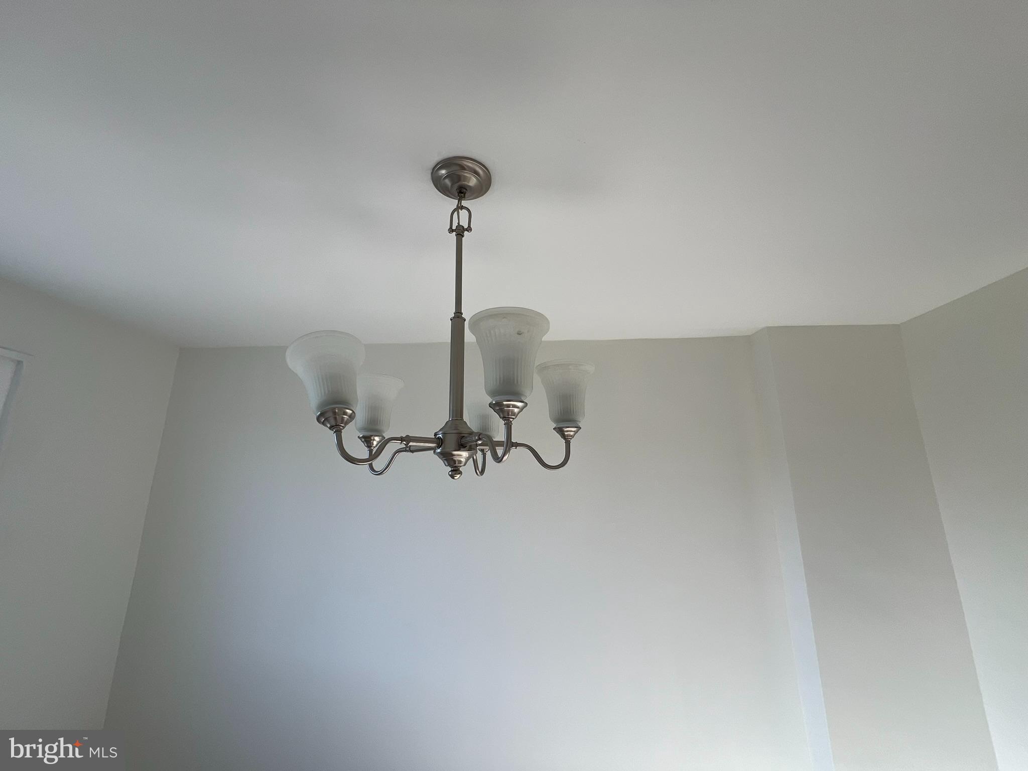 7827 Eastdale Road Baltimore, MD 21224 - Photo 4 of 18 Elevated light fixture in dining room