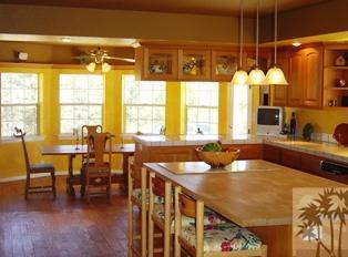 35680 Butterfly Peak Road Mountain Center, CA 92561 - Photo 10 of 19 a view of a dining room with furniture and window