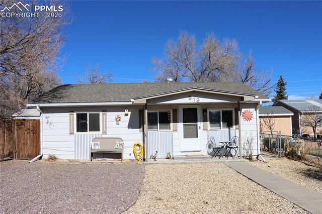 a front view of a house with a patio