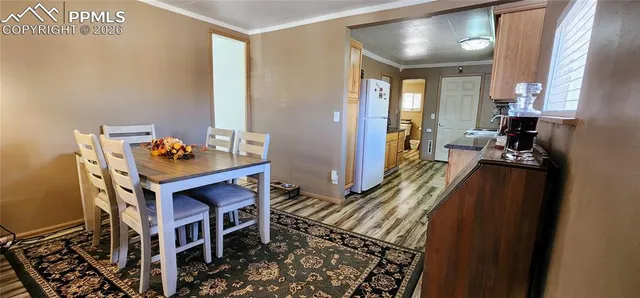 a view of living room and kitchen with furniture