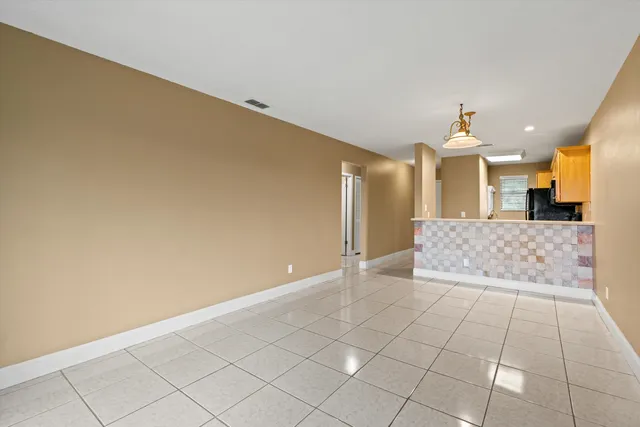 a view of a kitchen with a sink