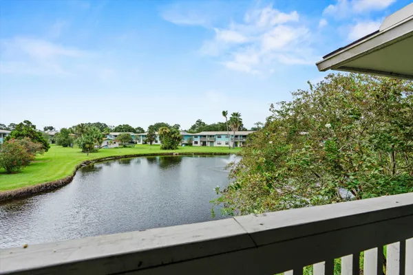 a view of a lake from a balcony