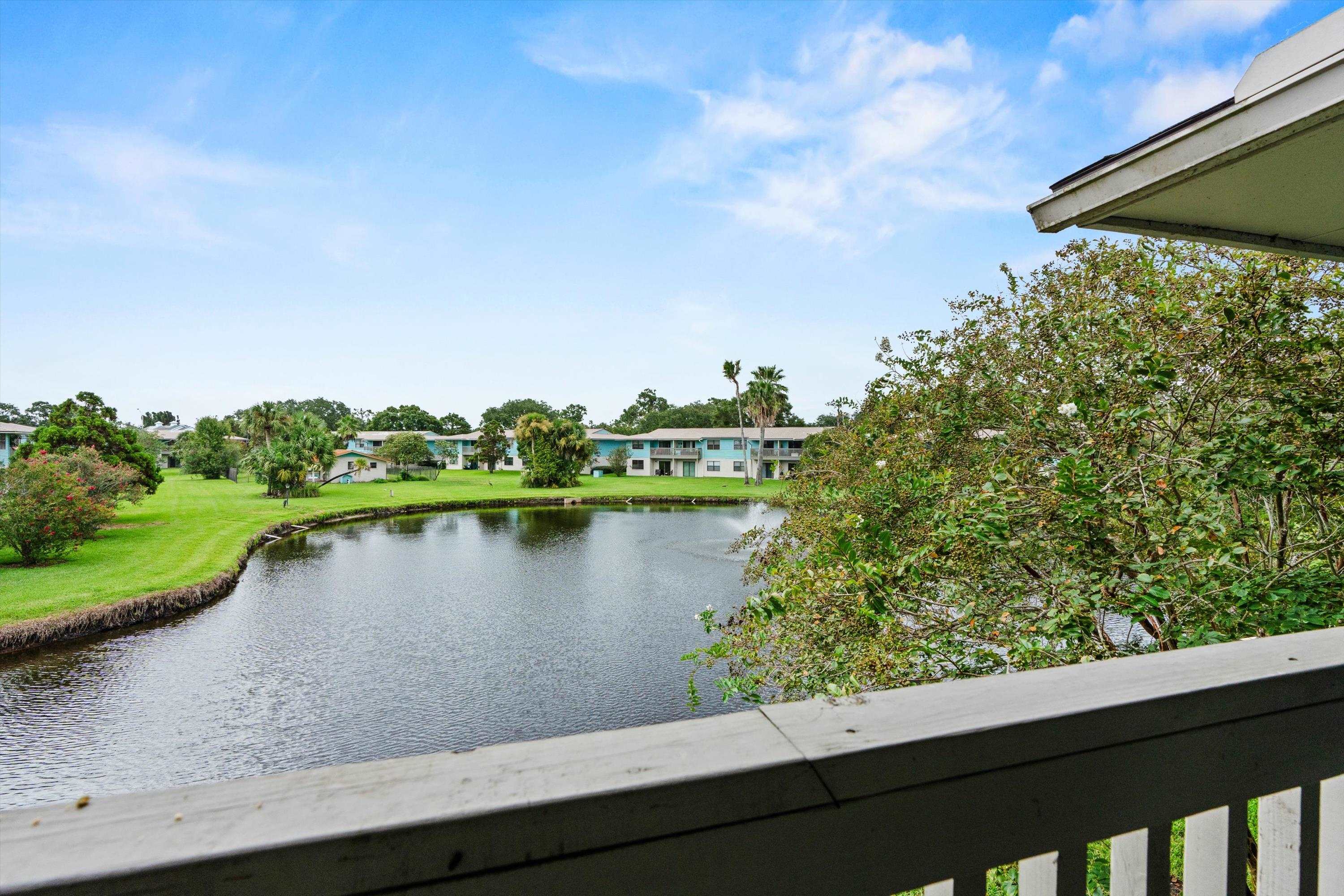 650 West Pope Road, Unit 208 St. Augustine, FL 32080 - Photo 24 of 35 a view of a lake from a balcony