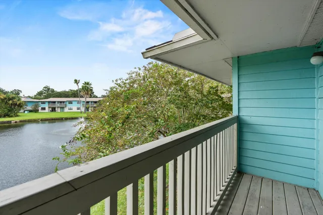 a view of a balcony with lake view