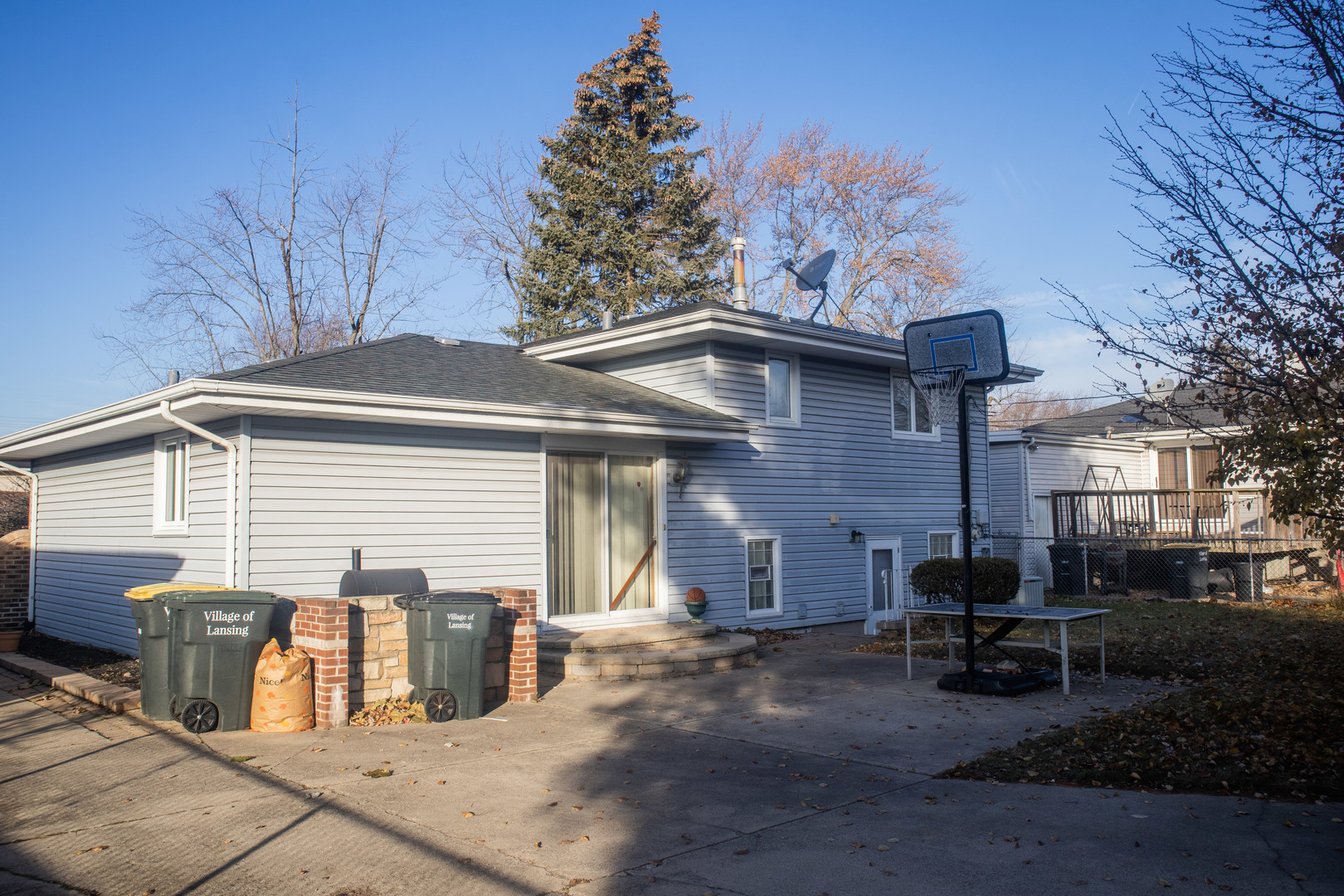 18339 Bock Road Lansing, IL 60438 - Photo 18 of 20 a view of a house with a patio