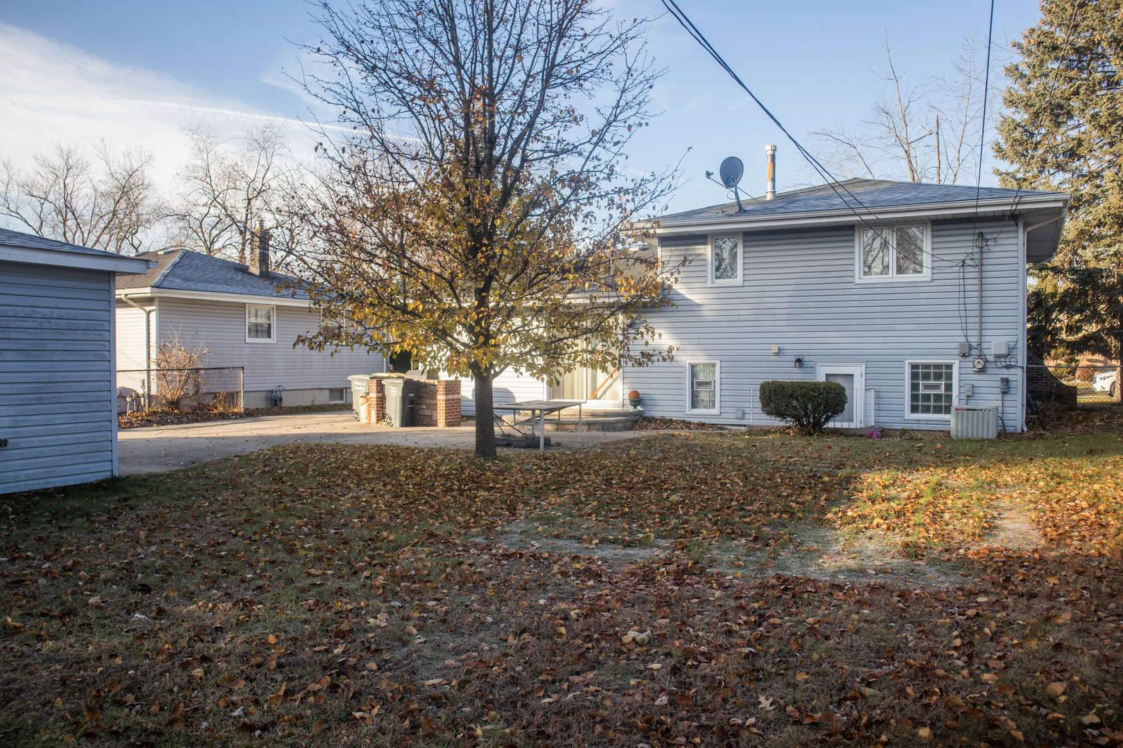18339 Bock Road Lansing, IL 60438 - Photo 19 of 20 a view of a house with a back yard