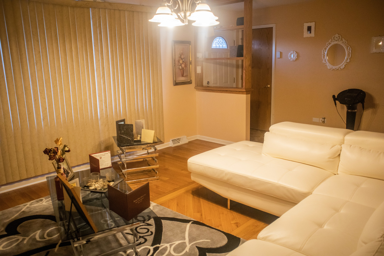 18339 Bock Road Lansing, IL 60438 - Photo 5 of 20 a bedroom with a bed and chandelier