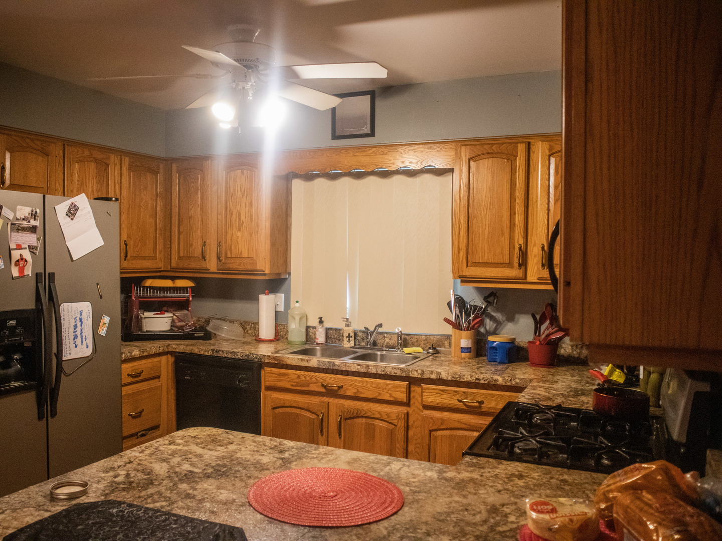 18339 Bock Road Lansing, IL 60438 - Photo 8 of 20 a kitchen with a sink stove and refrigerator