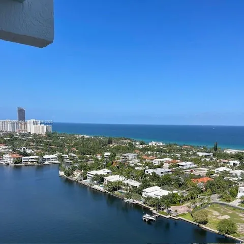 a view of a city with tall buildings