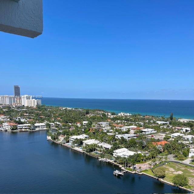 20201 East Country Club Drive, Unit 704 Aventura, FL 33180 - Photo 2 of 46 a view of a city with tall buildings
