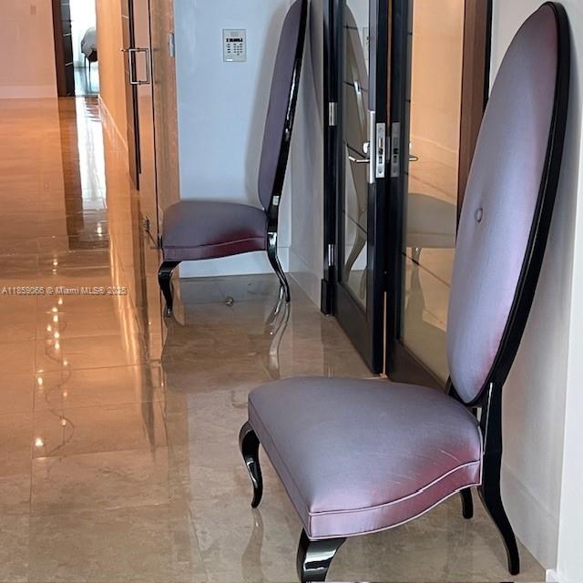 20201 East Country Club Drive, Unit 704 Aventura, FL 33180 - Photo 23 of 46 a bathroom with a tub