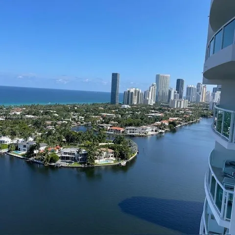 a view of a city with tall buildings