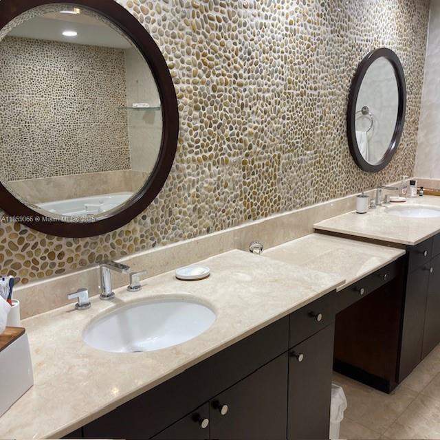 20201 East Country Club Drive, Unit 704 Aventura, FL 33180 - Photo 33 of 46 a bathroom with a sink and a mirror