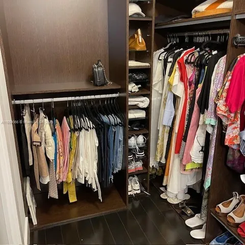 a view of sitting area and tub in the back yard