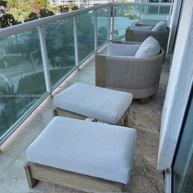 20201 East Country Club Drive, Unit 704 Aventura, FL 33180 - Photo 37 of 46 a view of sitting area and tub in the back yard