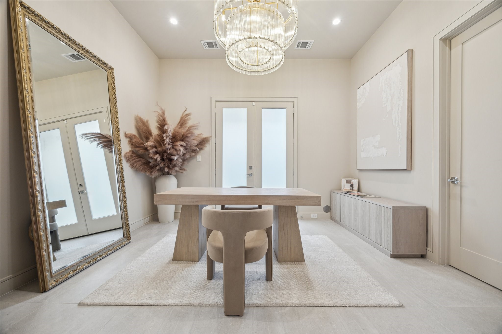 5820 Winsome Lane, Unit B Houston, TX 77057 - Photo 8 of 22 a dining room with wooden floor and a chandelier
