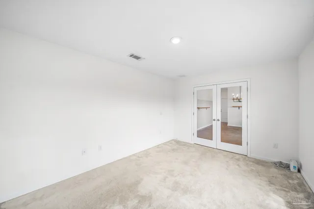 an empty room with a natural light