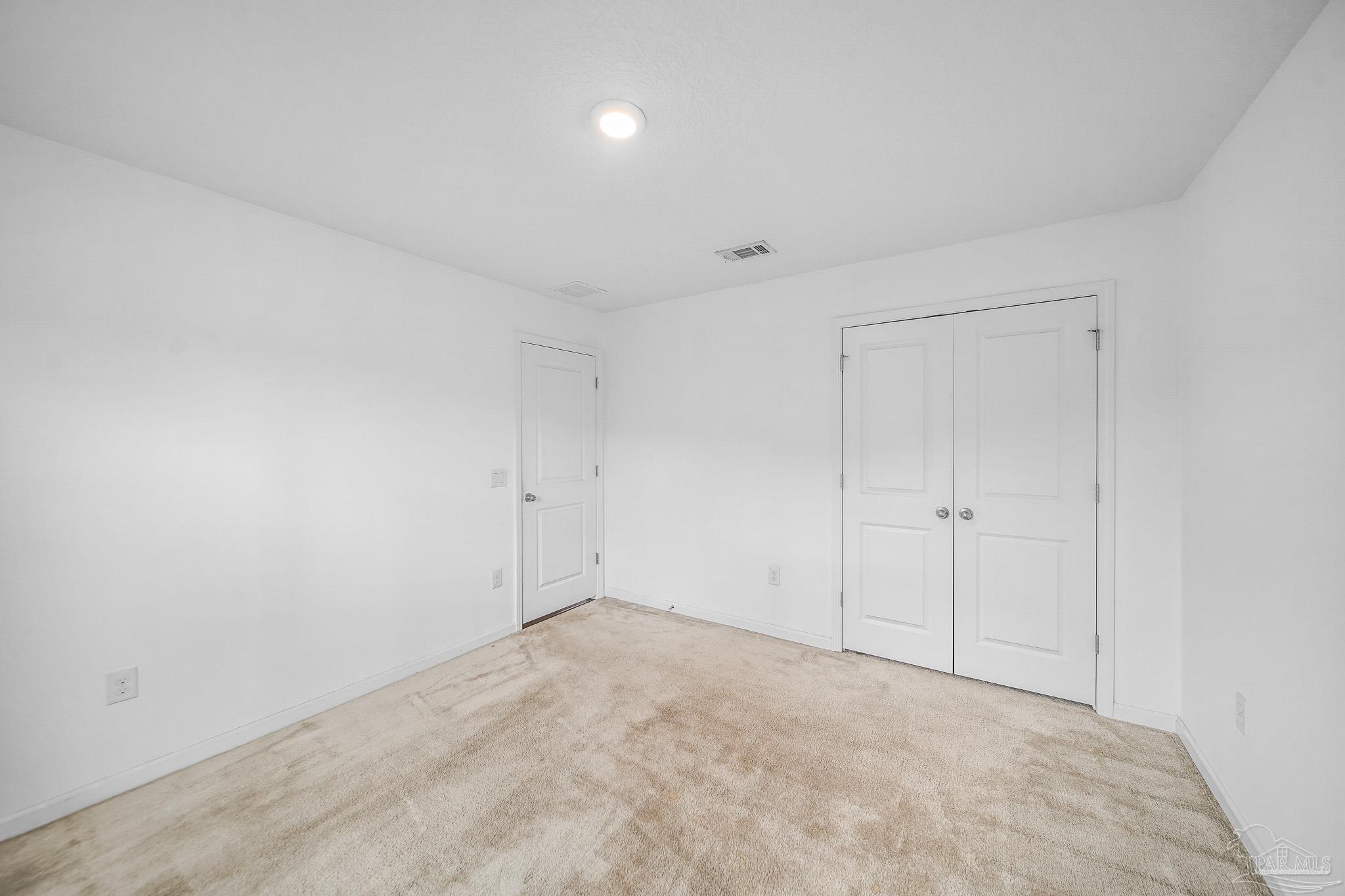 4706 Determination Court Milton, FL 32570 - Photo 20 of 34 a view of an empty room