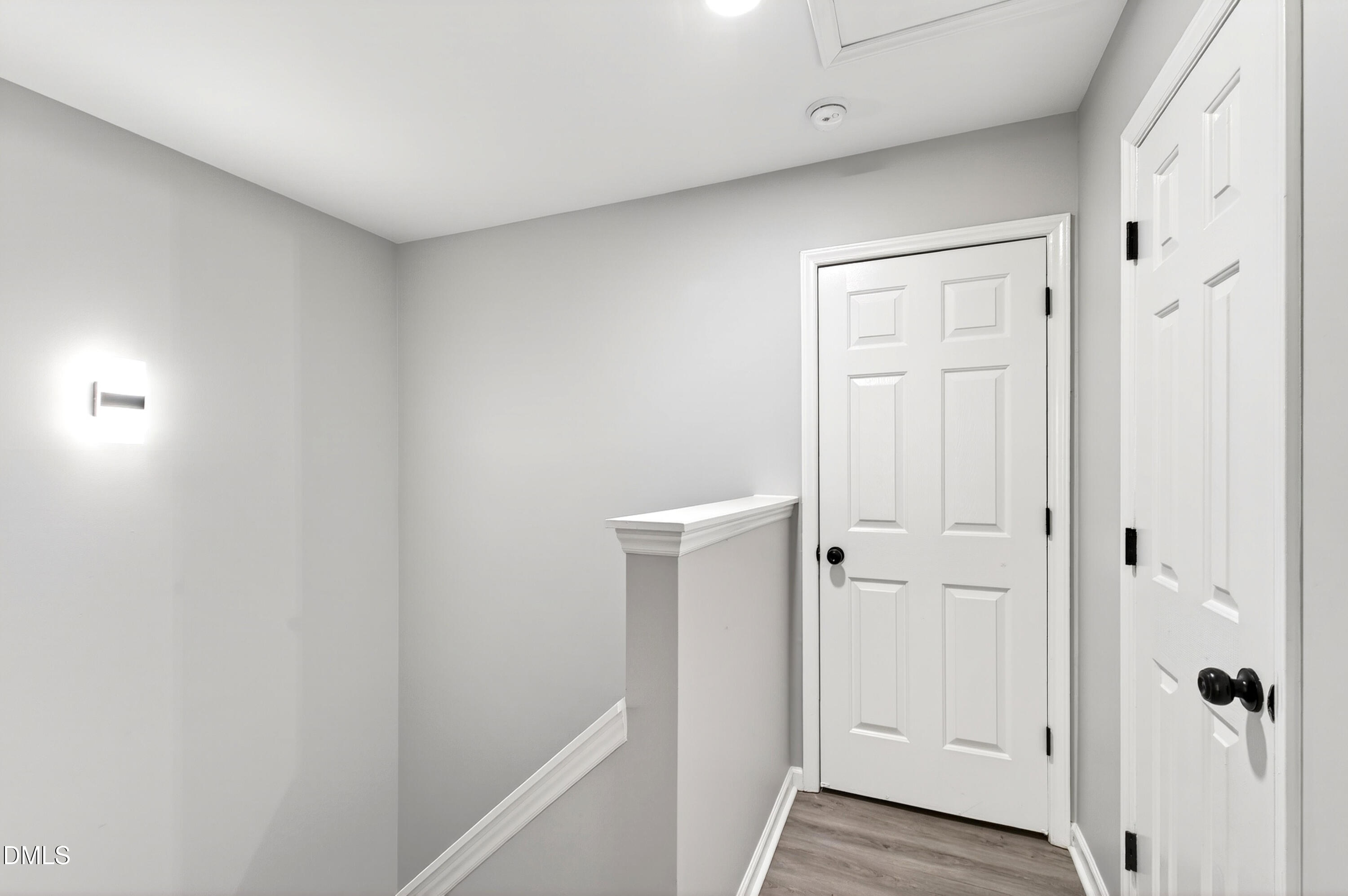 37 Red Lane Raleigh, NC 27606 - Photo 13 of 32 a view of a closet area with hardwood floor